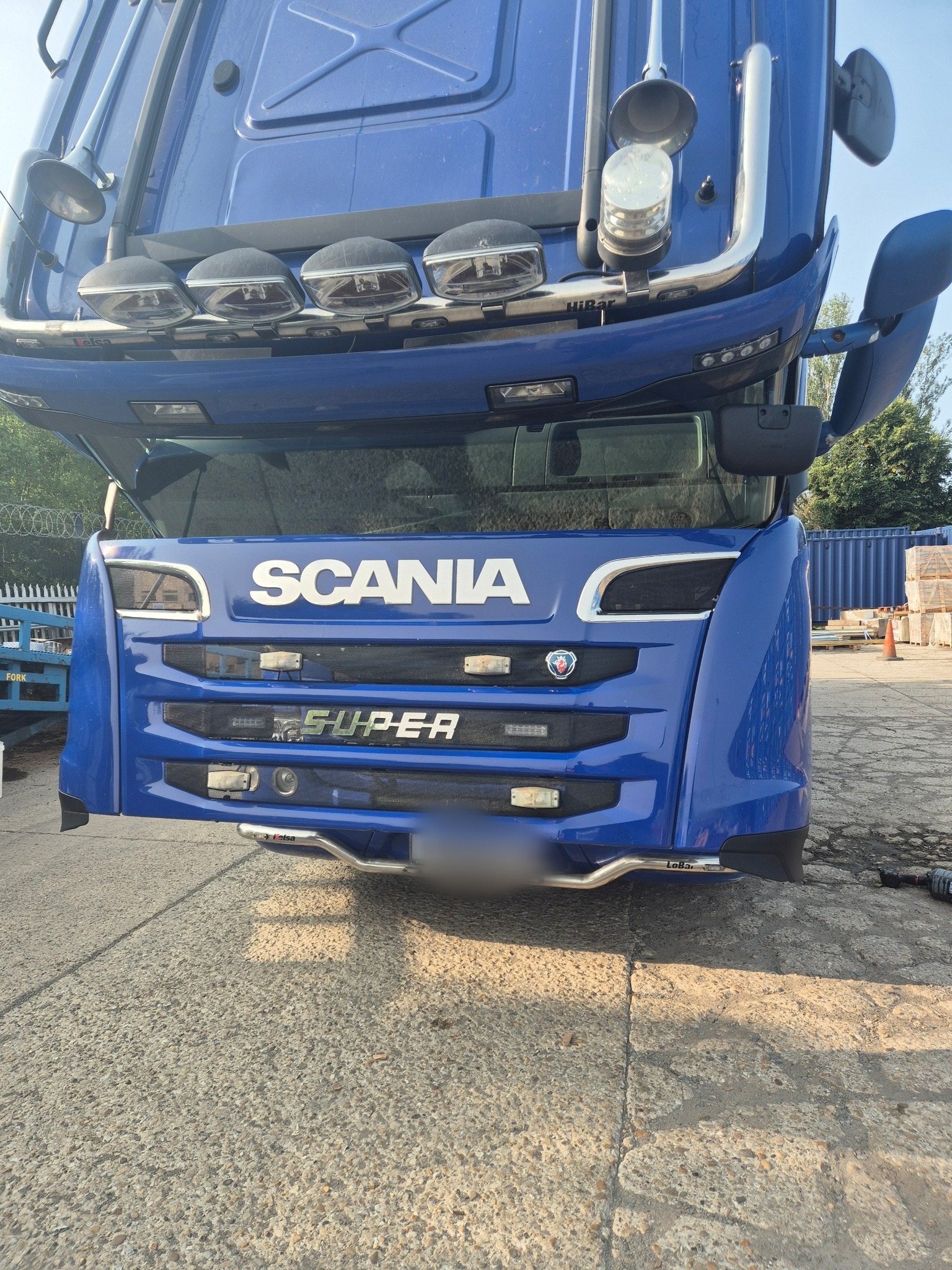 Blue Scania truck being serviced in Oxford